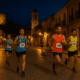 unners passing through illuminated streets during the Huércal-Overa Night Race 2025