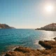 Historic Almeria coastline in bright Mediterranean sunlight, symbolising the true origin of the Costa del Sol name coined in 1928.