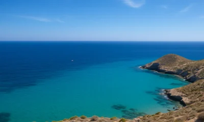 Turquoise Mediterranean sea near Agua Amarga with rocky coastline in Cabo de Gata Natural Park, Almeria