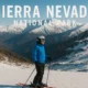 Skier in Sierra Nevada National Park near Puerto de la Ragua with snowy mountain peaks