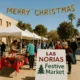 Christmas market in Las Norias with festive stalls and visitors enjoying the event