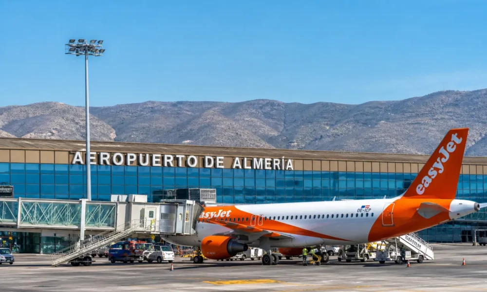 Almeria airport flights at terminal with aircraft on runway