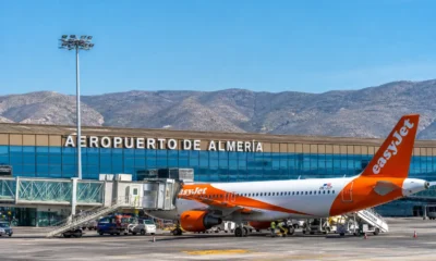 Almeria airport flights at terminal with aircraft on runway