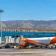Almeria airport flights at terminal with aircraft on runway