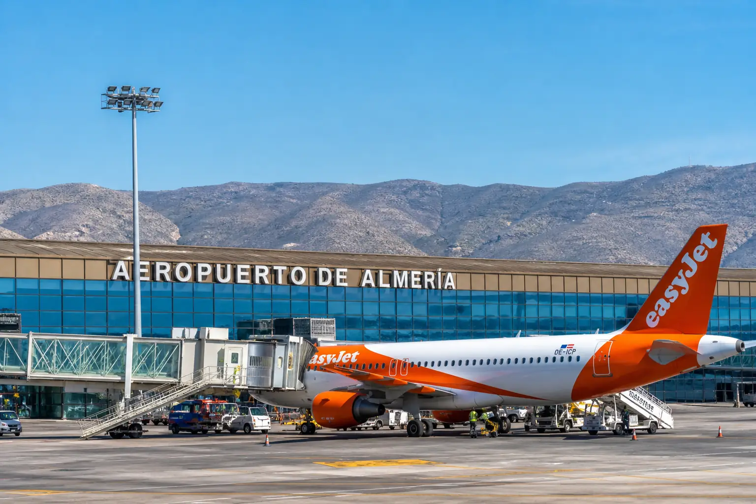 Almeria airport flights at terminal with aircraft on runway