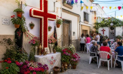 Cruces de Mayo in Vicar with decorated crosses and neighbourhood gathering