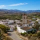 Traditional white village of Urracal in the Almanzora Valley surrounded by farmland and mountains in Almeria province