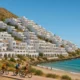 Mojacar town with hotels and tourists enjoying summer sunlight and coastal cycling trails