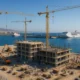 Construction of new cruise terminal at Almeria Port with cranes and maritime facilities in view