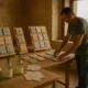 Handcrafted ceramics and recycled crafts displayed at Faro de Roquetas lighthouse exhibit
