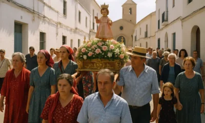 Divina Infantita statue procession through El Ejido streets during centenary celebration