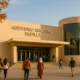 Maestro Padilla Auditorium entrance in Almeria during late afternoon with people arriving for a musical event.